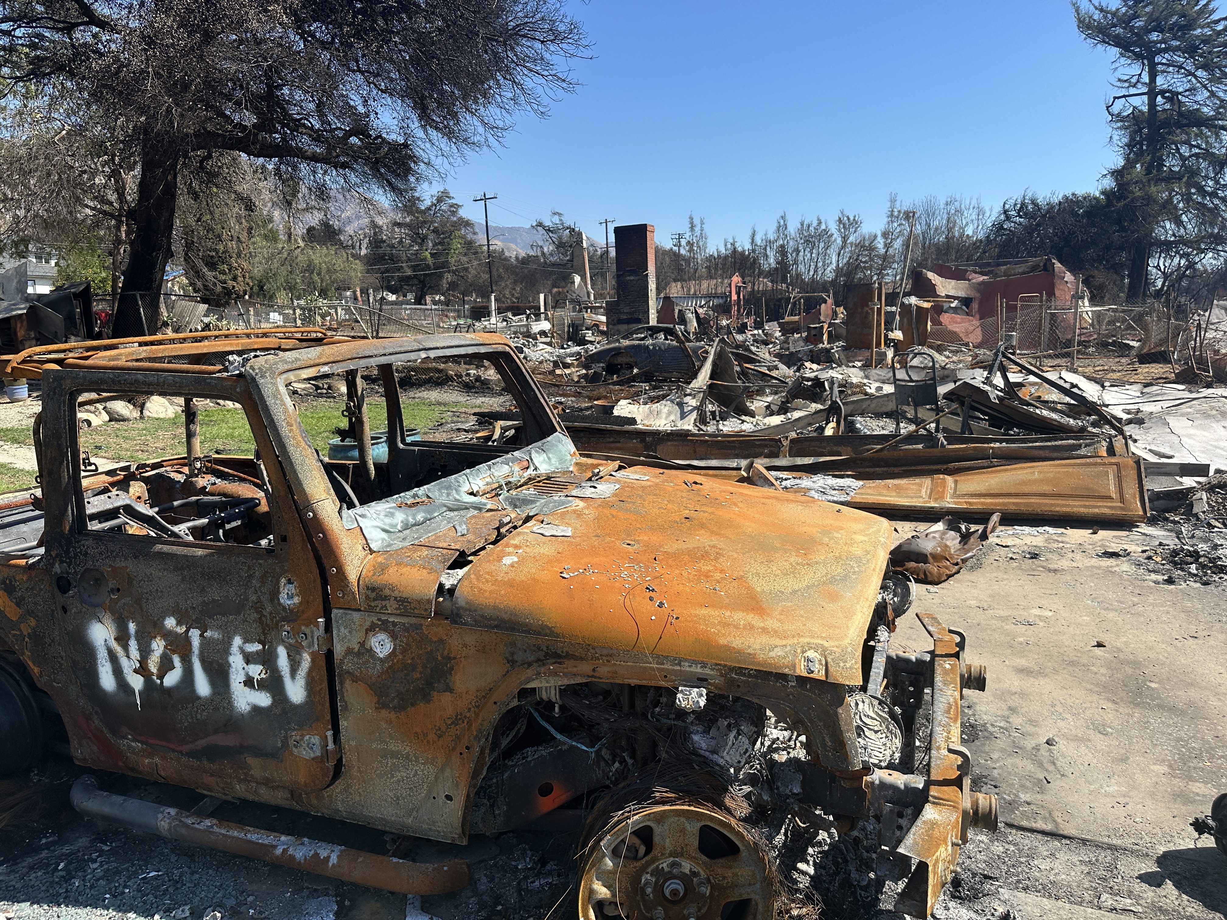 Burned car in Altadena marked NOT EV