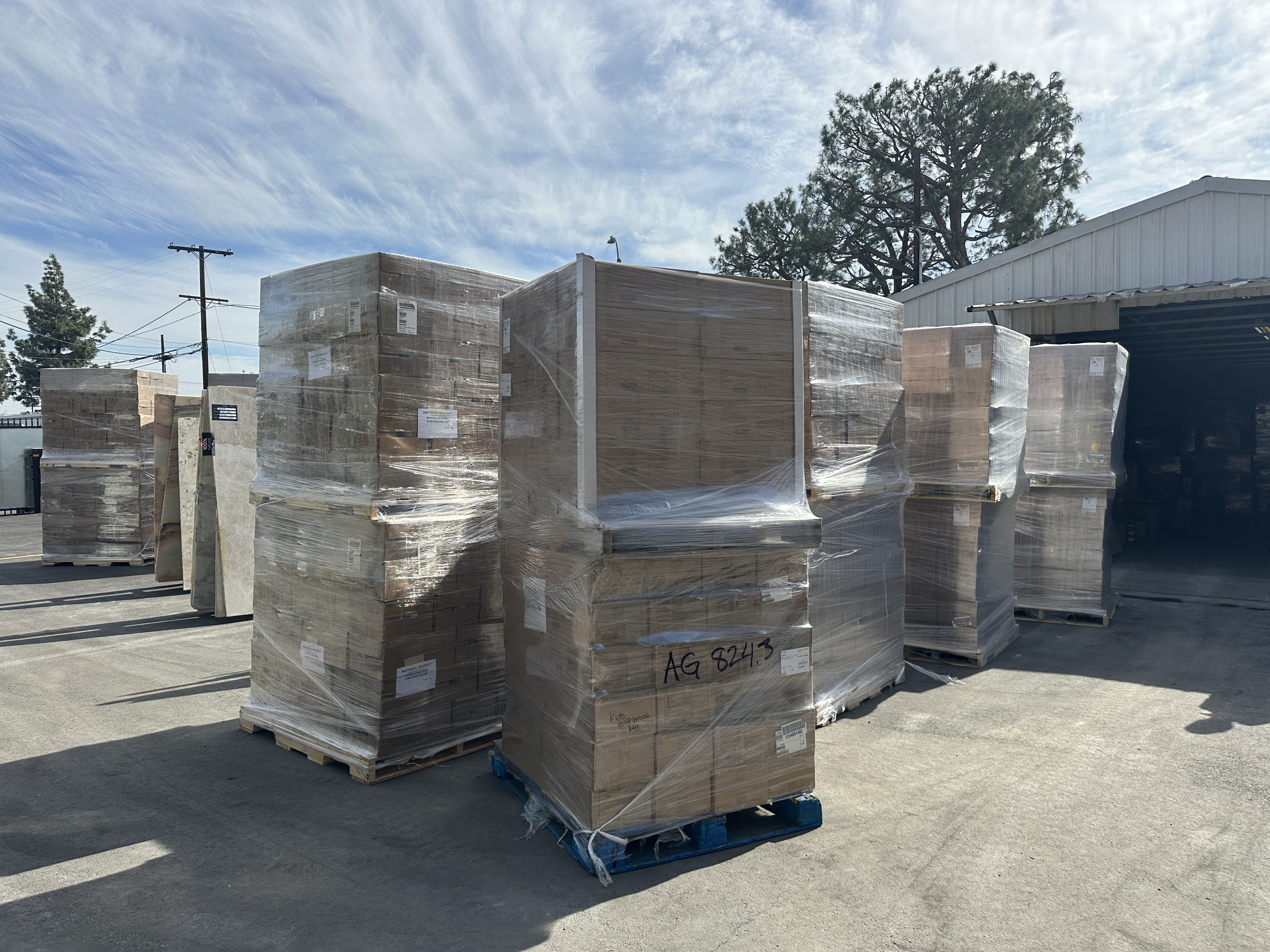 Outside Kate's Warehouse, shipments of boxes