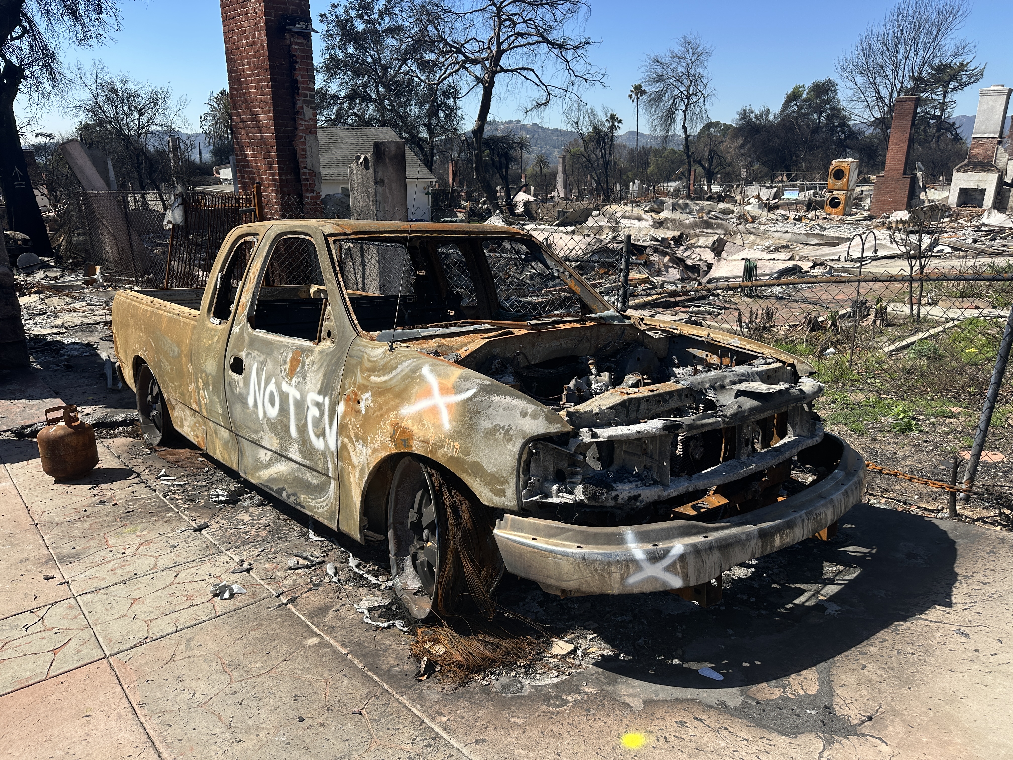 Burned car marked NOT EV